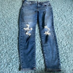 Distressed midwash jeans